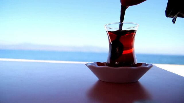 Drinking a cup of tea with sea view