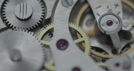 Intricate and elaborate details of mechanical watch finely crafted gears and essential components. Soft focus