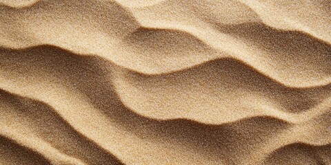 Wavy pattern of golden sand texture on a soft brown background with ample copy space in the center ideal for creative designs and presentations