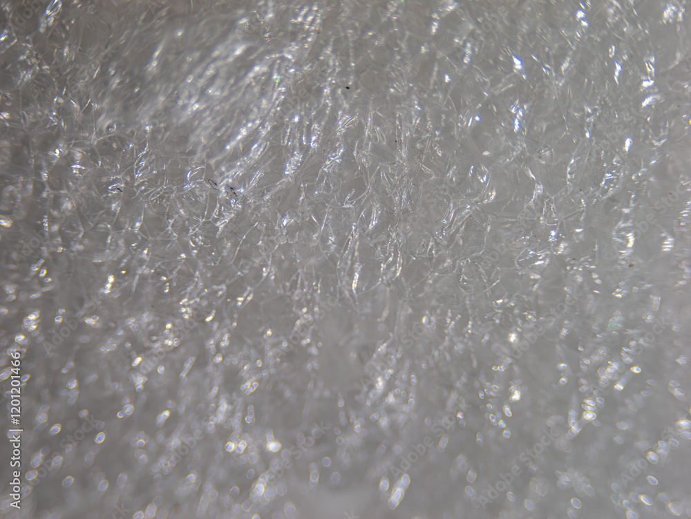 Poster the image is of a white surface with a lot of water droplets on it