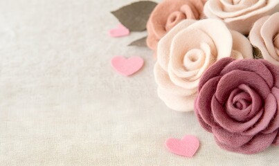 Soft lovely pink felt roses on beige background, Generative AI