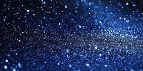 Dark blue glittery background with sparkling speckles scattered across a smooth surface creating a dynamic texture ideal for design projects
