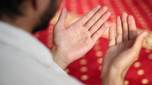 muslim prayer in mosque with hand