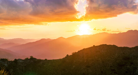 Fototapeta premium beautiful scenic sunset landscape of a canyon between two mountains