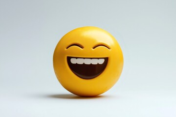 Fototapeta premium 3d of a laughing emoji with closed eyes, showing teeth, on white background, representing joy and happiness