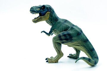 Green toy dinosaur with open mouth. tyrannosaurus rex on a white background.