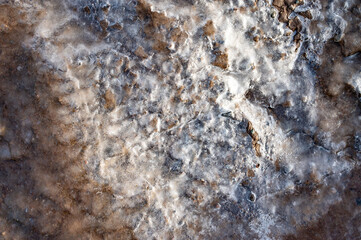 Melting ice opens ground, resources and minerals concept. Top shot. Ecology, melting ice, climate change, global warming concept, Greenland.