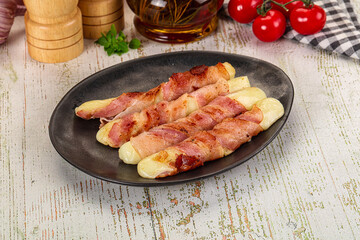 Hot mozzarella sticks with bacon