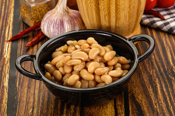 Baked white canned beans in the bowl