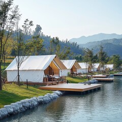 White Tented Lodges on Lakefront with Mountain Views Resort Glamping Destination Nature Vacation