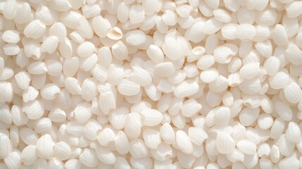 A simple image of a pile of white rice on a table, suitable for use in various contexts