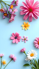 Creative abstract composition with various spring flowers on pastel blue background. Minimal fly or levitate natural concept with place for text, craft clay, with white tones