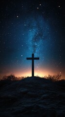 Cross on a hill against the background of the night starry sky. Silhouette of a cross against the background of the night sky with stars.