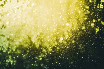 Abstract green and yellow light burst with sparkling particles