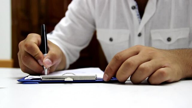 Person writing essay 