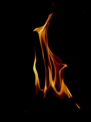 bright flame of fire in the dark