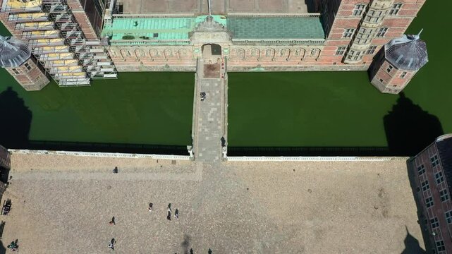Neptune Fountain At Frederiksborg Castle In Summer In Hillerod, Denmark. - aerial tilt-up shot