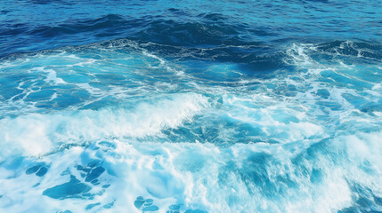 Pure blue turquoise water texture of the ocean sea with foam from and waves