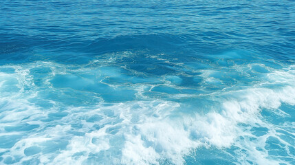 Obraz premium Pure blue turquoise water texture of the ocean sea with foam from and waves