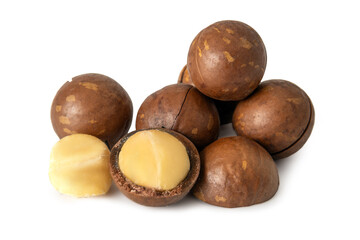 Macadamia nuts display showcasing their hard shells and creamy interior in a bright setting