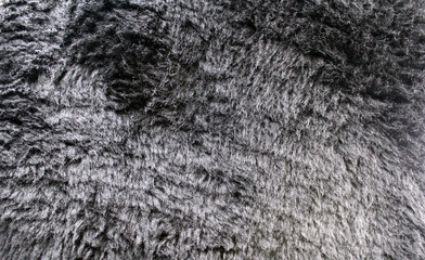 Grey gray fluffy fur plush fabric abstract textured background