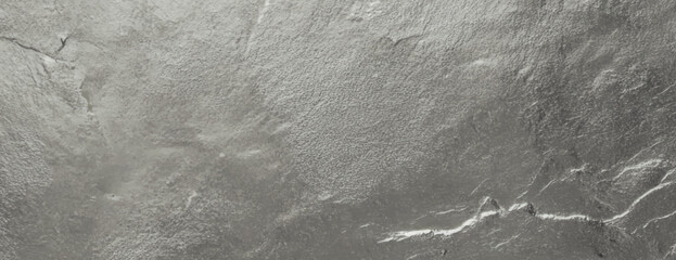 Naklejka premium Gray stone background with a rough texture. The background features a natural, uneven surface with gray tones throughout. Textured stone background vector. Gray background.