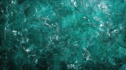 Obraz premium Captivating swirling turquoise and teal marble like underwater ocean wave texture with a dynamic fluid and powerful movement