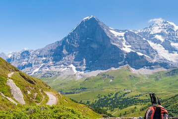trekking trail on the background of the famous Eiger peak North wall, Bernese Oberland,...
