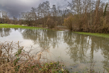 Normandy, France, Europe : Exterior photo view water floods due to climate change in fields creating damage disaster in agriculture environement