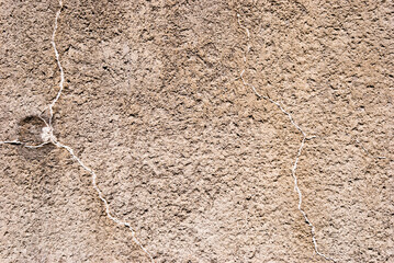 Type of cracked plastered concrete surface with small cracks