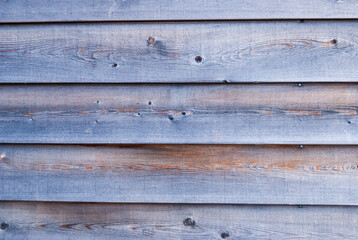 Texture of grey darkened old wooden wall