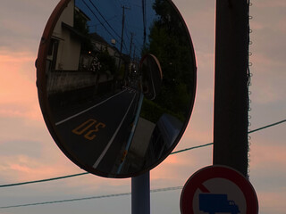 Scenery reflected in a convex mirror in the suburbs of Japan
