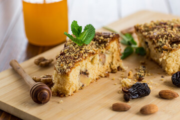 Homemade sponge cake with nuts and prunes