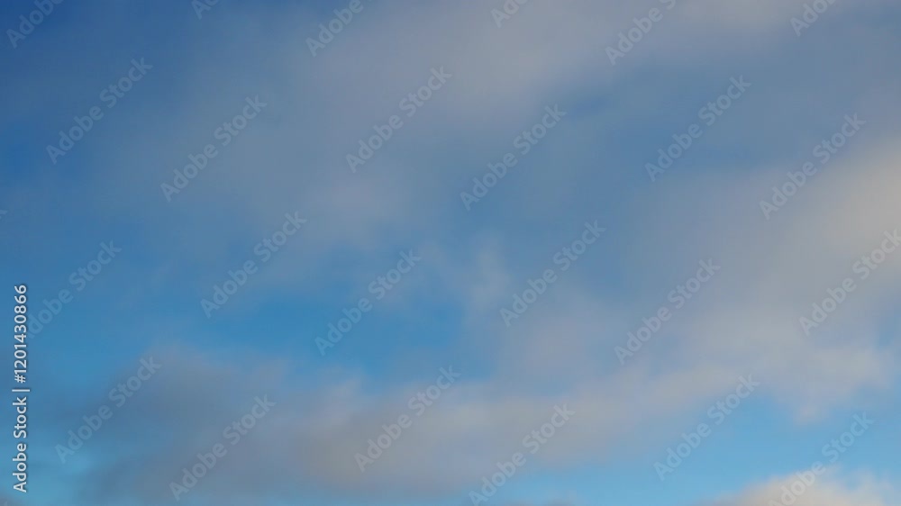 Poster observe dynamic flow of clouds against a vibrant blue sky, real time capture. experience gradual shi