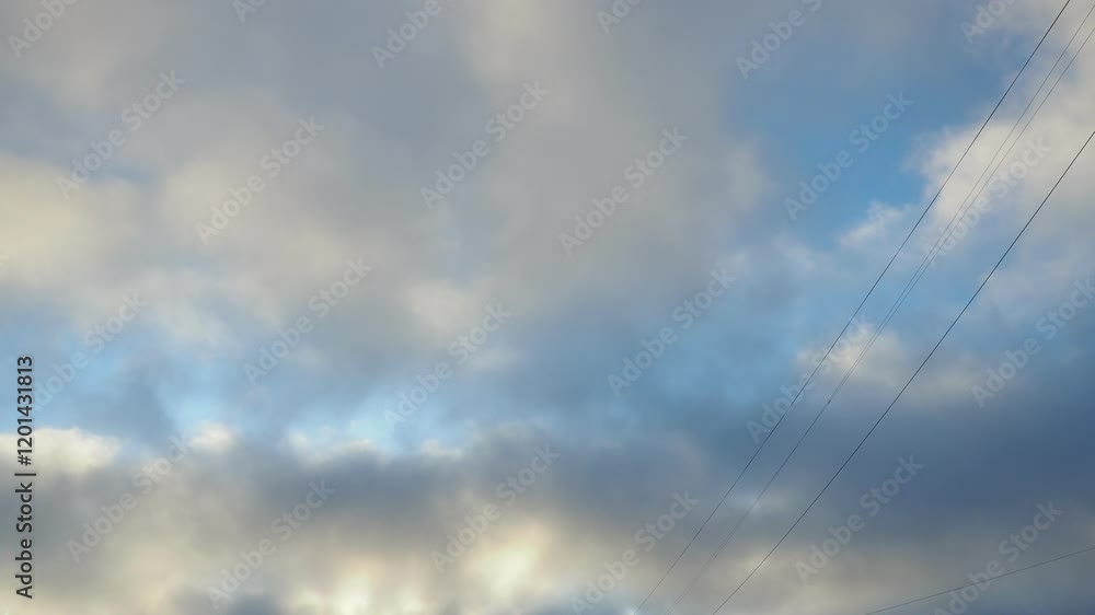 Poster observe dynamic flow of clouds against a vibrant blue sky, real time capture. experience gradual shi