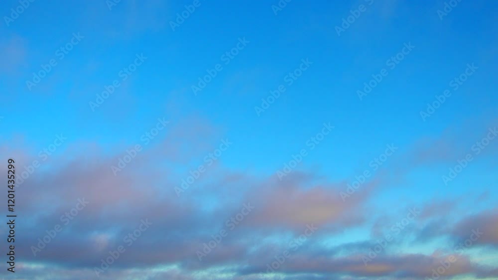 Poster observe dynamic flow of clouds against a vibrant blue sky, real time capture. experience gradual shi