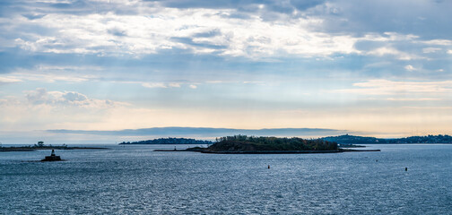 A panorama view sailing past Nixs Mate and Long island into Boston in the early morning in the fall © Nicola