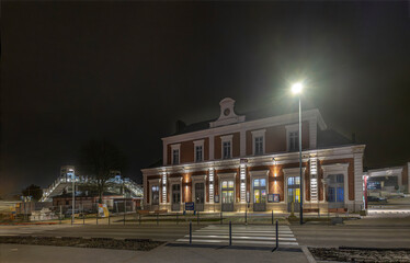 Normandy, France -12- 30- 2024 : Exterior night photo view of christmas light decorations for xmas celebrations decor evening with garlands and tinsel lights,
