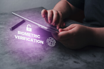 Biometric authentication concept. Digital tablet with fingerprint scanning. Access password thru...