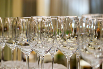 Close-Up of Crystal Clear Wine Glasses in a Row
