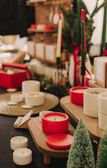 Home comfort, coziness, aromatherapy. Cozy candles and aroma perfume in market. Soft focus