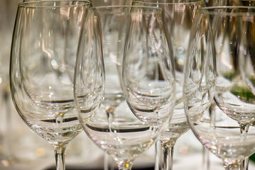 Close-Up of Wine Glasses Reflecting Elegant Lighting
