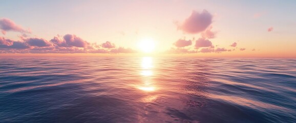 Fototapeta premium A serene ocean scene at sunset, with the sun setting behind a cloud in front of an endless horizon.