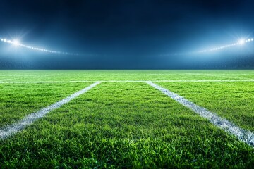 Obraz premium Night stadium, green grass field with bright floodlights.