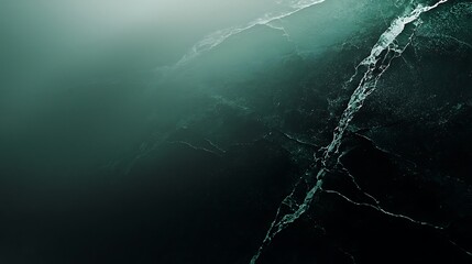 Dark green water, waves crashing, rocky coast, misty background; abstract nature background