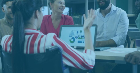 Image of financial data processing over diverse business people in office