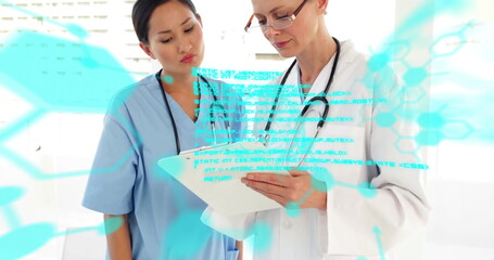 Image of data processing over diverse female doctors talking