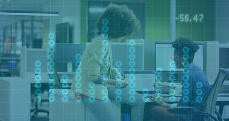 Image of financial data processing over diverse business people in office