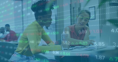 Image of financial data processing over diverse business people in office