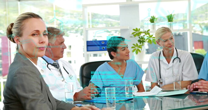 Image of data processing over diverse doctors at meeting